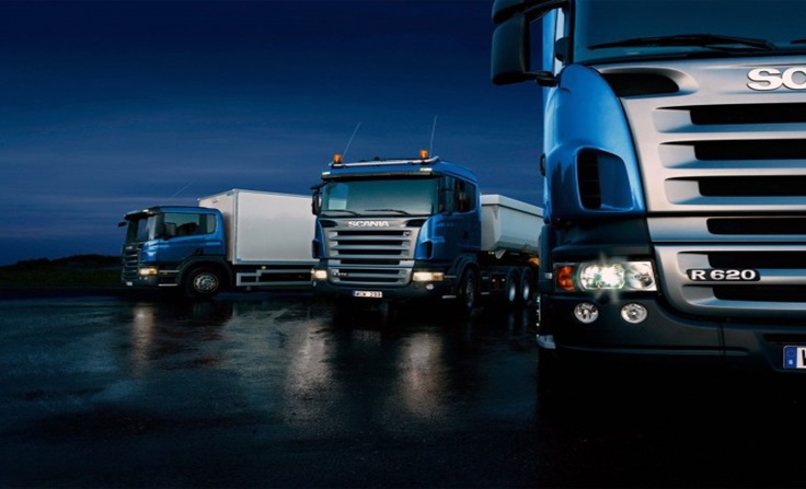 Three trucks on blue background 640x480 2